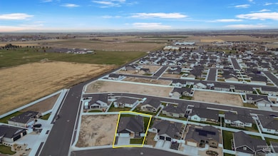 Aerial view of residential area featuring property parcel outlined