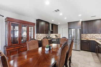 Dining space with recessed lighting