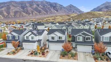 Mountain view featuring nearby suburban area