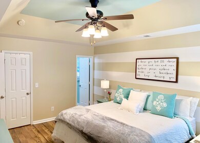 Master Bedroom features tray ceilings