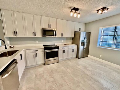 3313 Inverrary Blvd W, Lauderhill, FL 33319 - photo 2