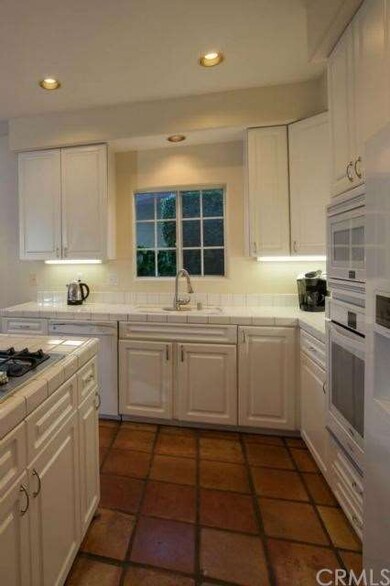 Spanish tiles adorning the ... LOVE the tiles in y