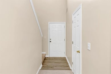 Hall featuring light hardwood / wood-style floorin