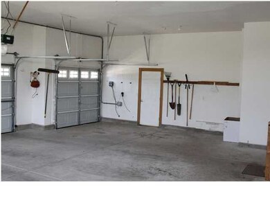 Inside the over-sized 3-car attached garage.