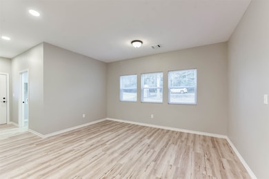 Just off the entrance, the dining room offers the perfect spot for family dinners or holiday gatherings.