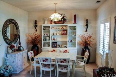Dining room with windows to front yard.  View from