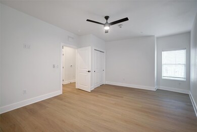 Unfurnished bedroom with light wood-style floors,