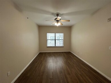 Unfurnished room featuring dark wood finished flo