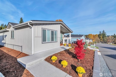 Vibrant and low maintenance landscaping with year 'round color and plantings.  Neatly defined areas and on street parking, plus visitor parking.