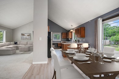 kitchen_dining_room_with_peak_of_living_