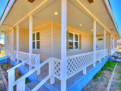 View of property exterior with a porch