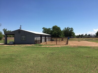 Barn, corral and pasture area