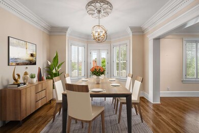 This flex space next to the kitchen serves as a lovely dining area, and opens onto the balcony