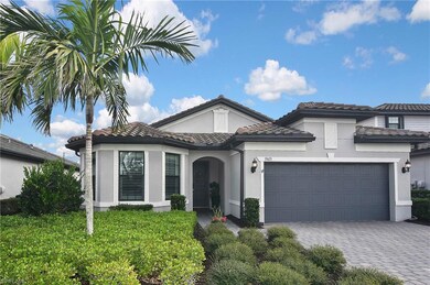 Mediterranean / spanish home featuring a garage