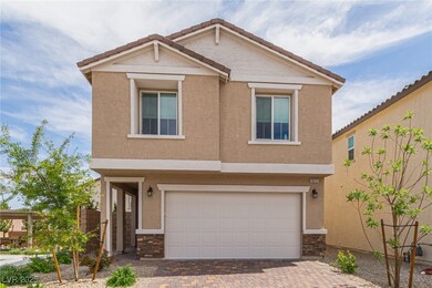 View of front facade featuring an attached garage,