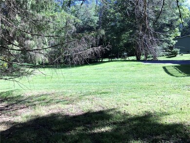 The back yard is relatively flat too and has plent