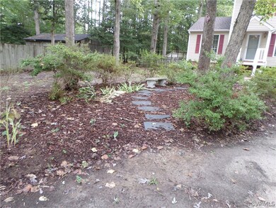 Serene garden and sitting area in front yard!