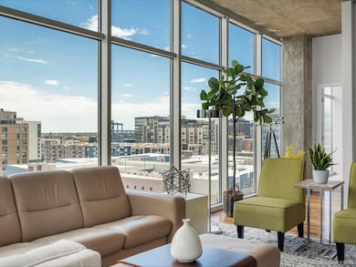 Open floor plan with floor to ceiling windows.  Very few buildings in site with views to Coors Field to the east and the mountains to the west.