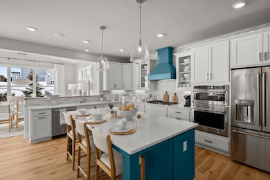 Our 'Lifestyle' kitchen layout features upgraded GE Cafe appliances.