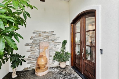 Water feature and beautiful double front door