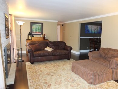 Large living room with new flooring and beautiful 