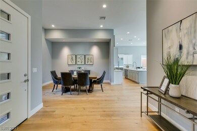 Formal dining room on your left. Additional lighti