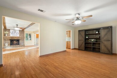 THE LARGE FRONT ROOM ALSO IS OPEN TO THE FAMILY RO