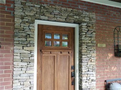 Craftsman style wood door.