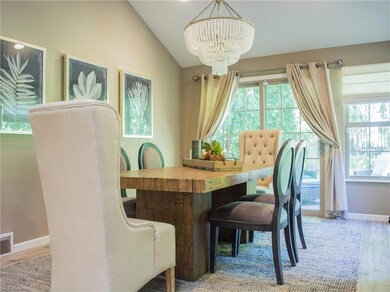 Wood floored dining space with a wealth of natural