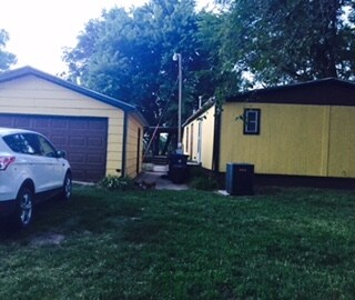 Two car detached garage WITH attached 8x8 storage 