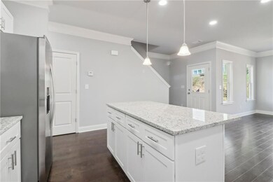 Kitchen with appliances with stainless steel finis