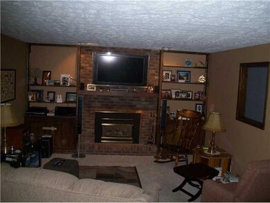 Family Room. FAMILY RM WITH BRICK GAS FIREPLACE AN