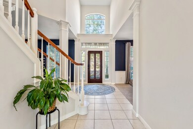 Bright and welcoming entry flooded with natural light, instantly inviting you into the home’s warm and airy atmosphere.