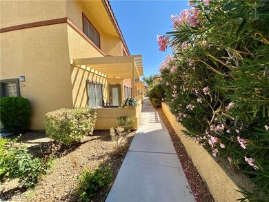 View of side of home featuring stucco siding and a