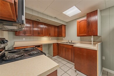 Refrigerator and stove included.