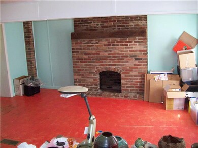 LIVING ROOM WITHIN LOG CABIN AREA WITH FIREPLACE