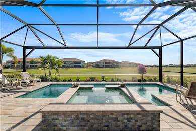 View of swimming pool with an in ground hot tub, g