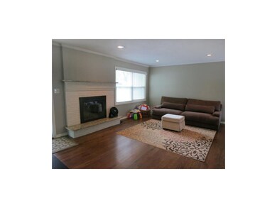 The fireplace showcases as the focal point of the 