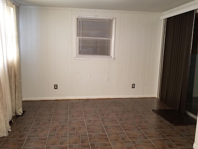 Dining Room which leads to Garage Entrance
