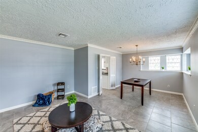 The formal living room and dining are open as you