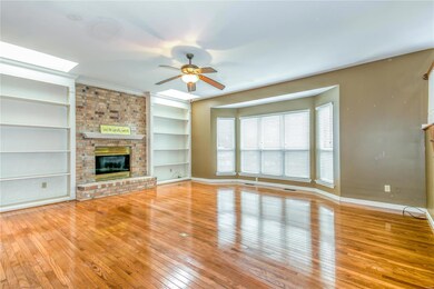 Huge Family Room with Gas Fireplace, bookshelves, 