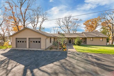View from the street, double garage and nice drive