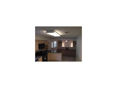 Den/Family/Great Room. Wall to wall bookcase and s