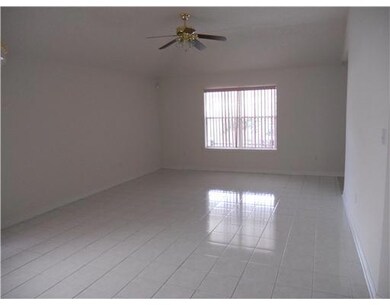 Living Room. Neutral colors, ceramic flooring, natural light and open floor plan