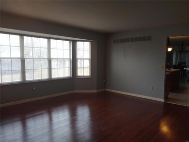 View of bay leading into kitchen.
