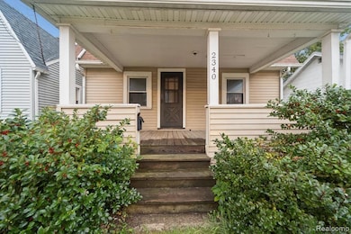 Entrance to property with covered porch