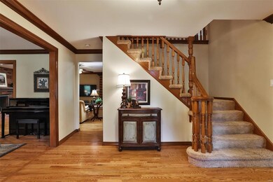 HARDWOOD EXTENDS THROUGH MAIN LEVEL