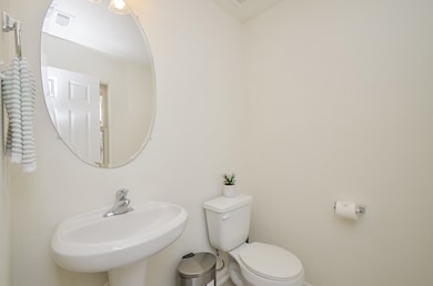 POWDER ROOM IS BRIGHT AND CLEAN LOCATED NEXT TO THE COAT CLOSET IN FRONT OF THE HOUSE. WITH THIS STRATEGIC LOCATION, VISITORS WON'T NEED TO GO WAY DEEP DOWN YOUR HOME TO USE THIS POWDER ROOM.