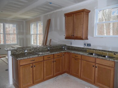 Kitchen with granite countertops