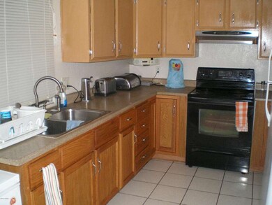 Kitchen w/ newer electric range